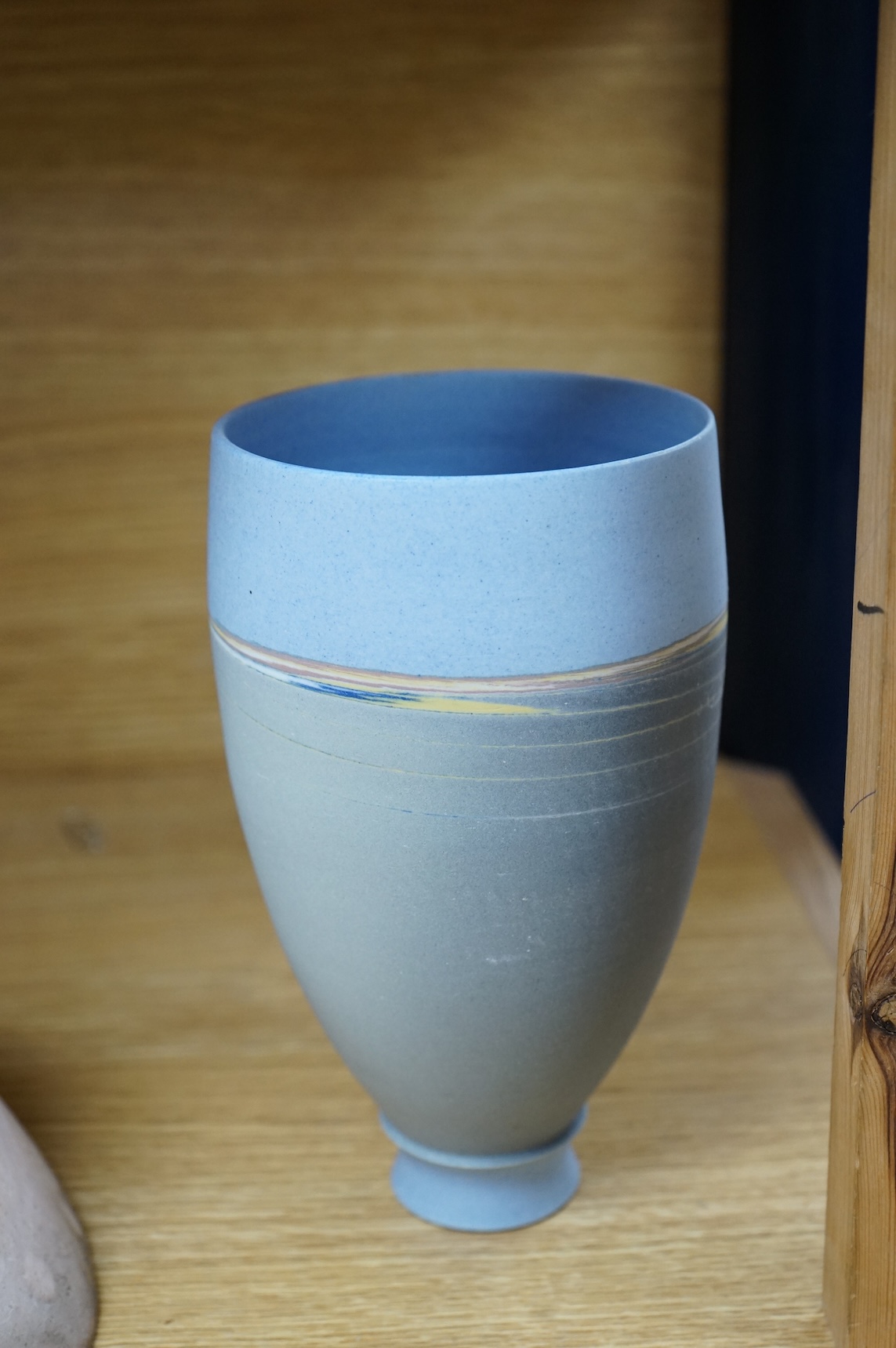 A studio pottery with incised initialled, dated ‘73 and a similar bowl, largest 21cm in diameter